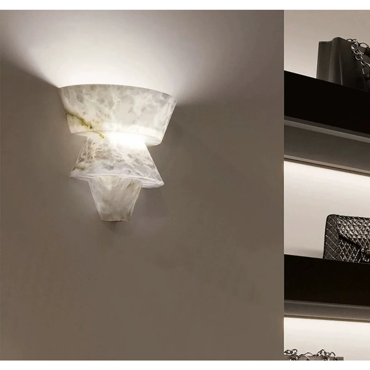 Backlit marble sconce showing veining