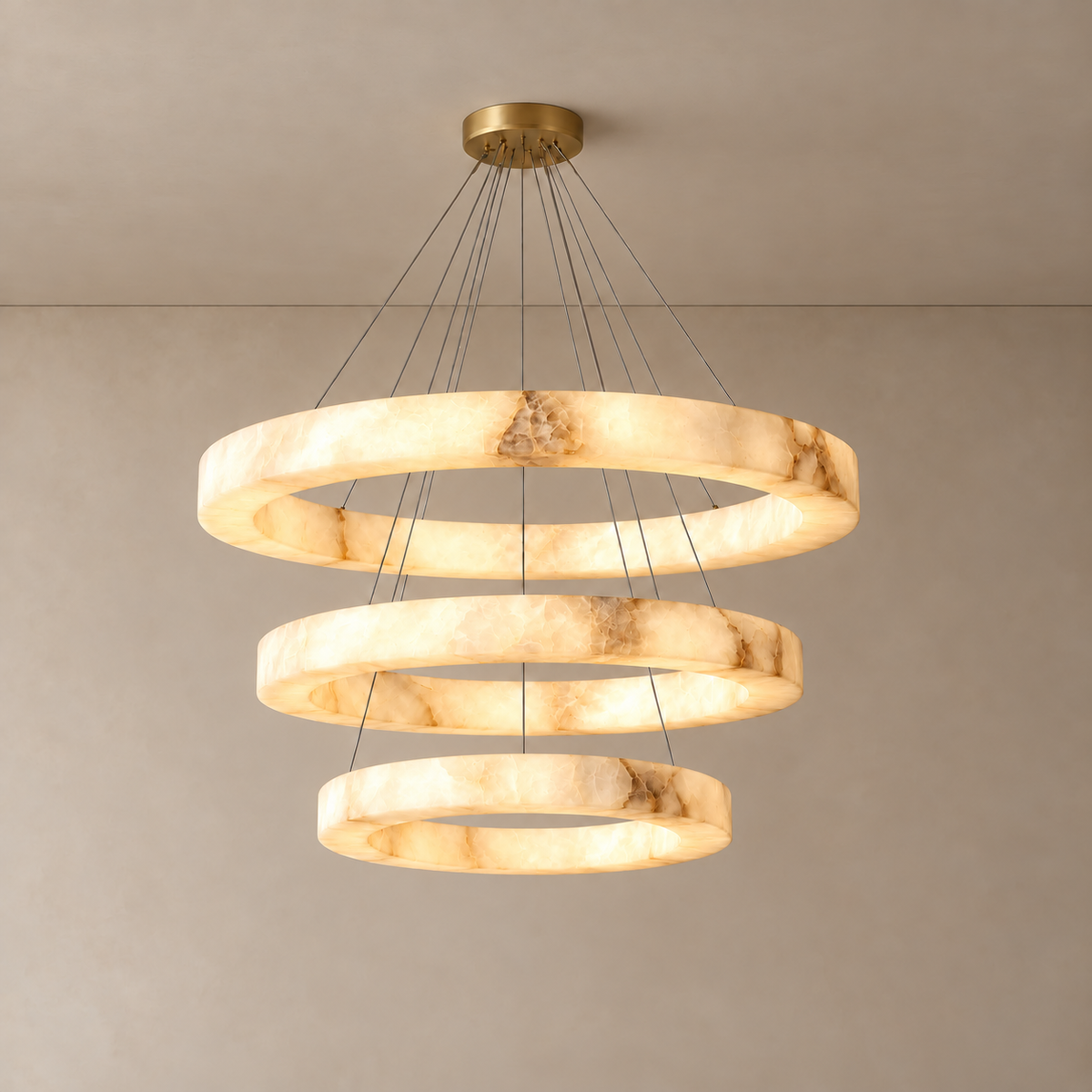Anelli Tre Large with three illuminated alabaster rings and visible mineral clouds.