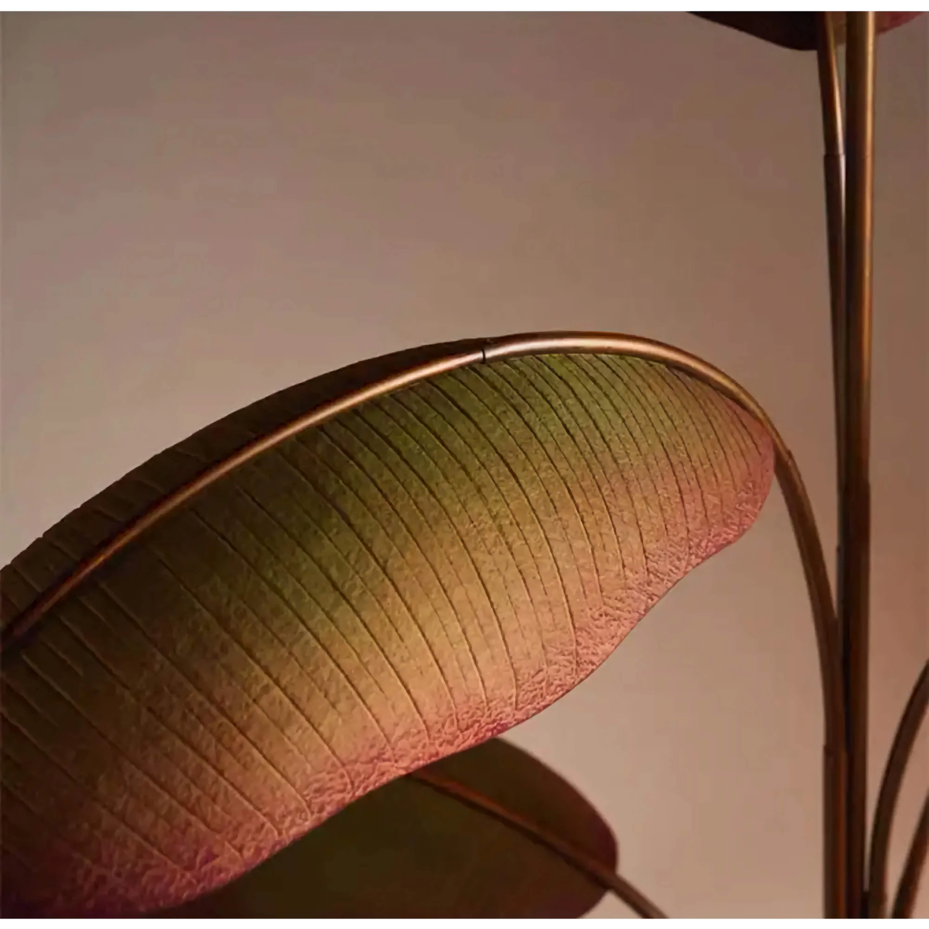Sculpted brass leaf and verdigris detail