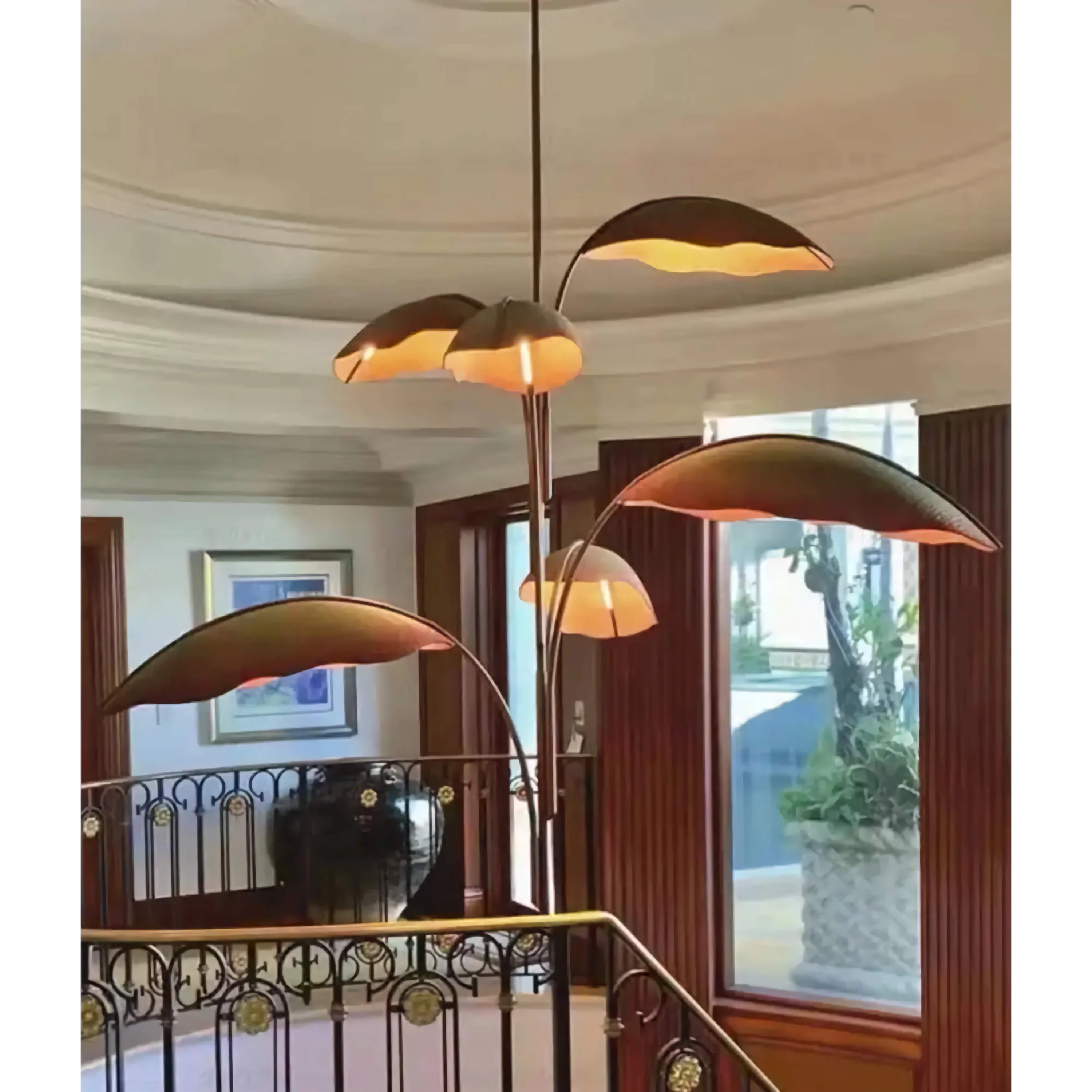 Banana leaf chandelier over a dining room