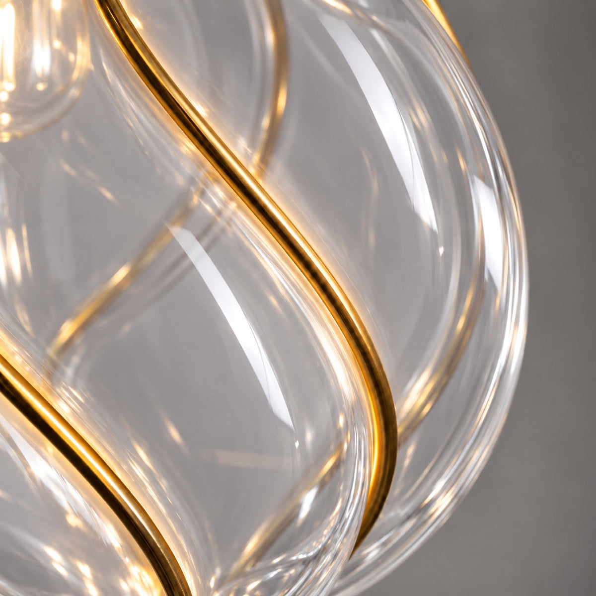 Detail of the brass spirals on the Belluno clear glass lantern pendant CLND038-C
