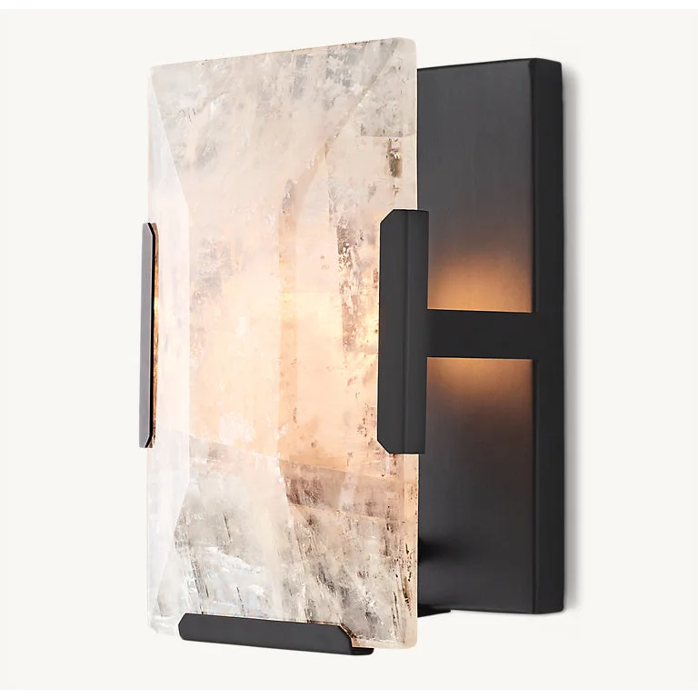 Black calcite sconce on a wall