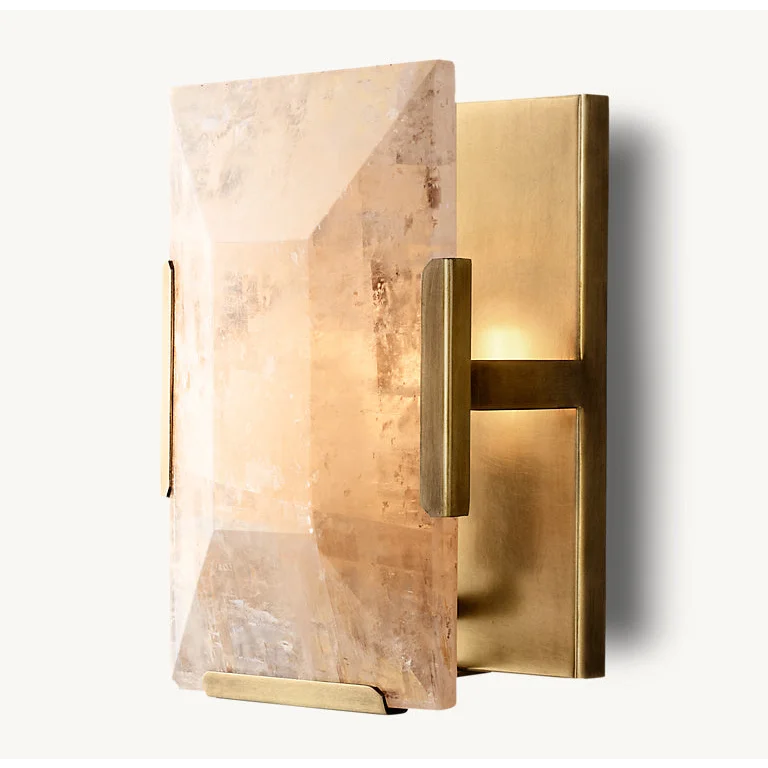 Calcite and copper wall sconce in a hallway