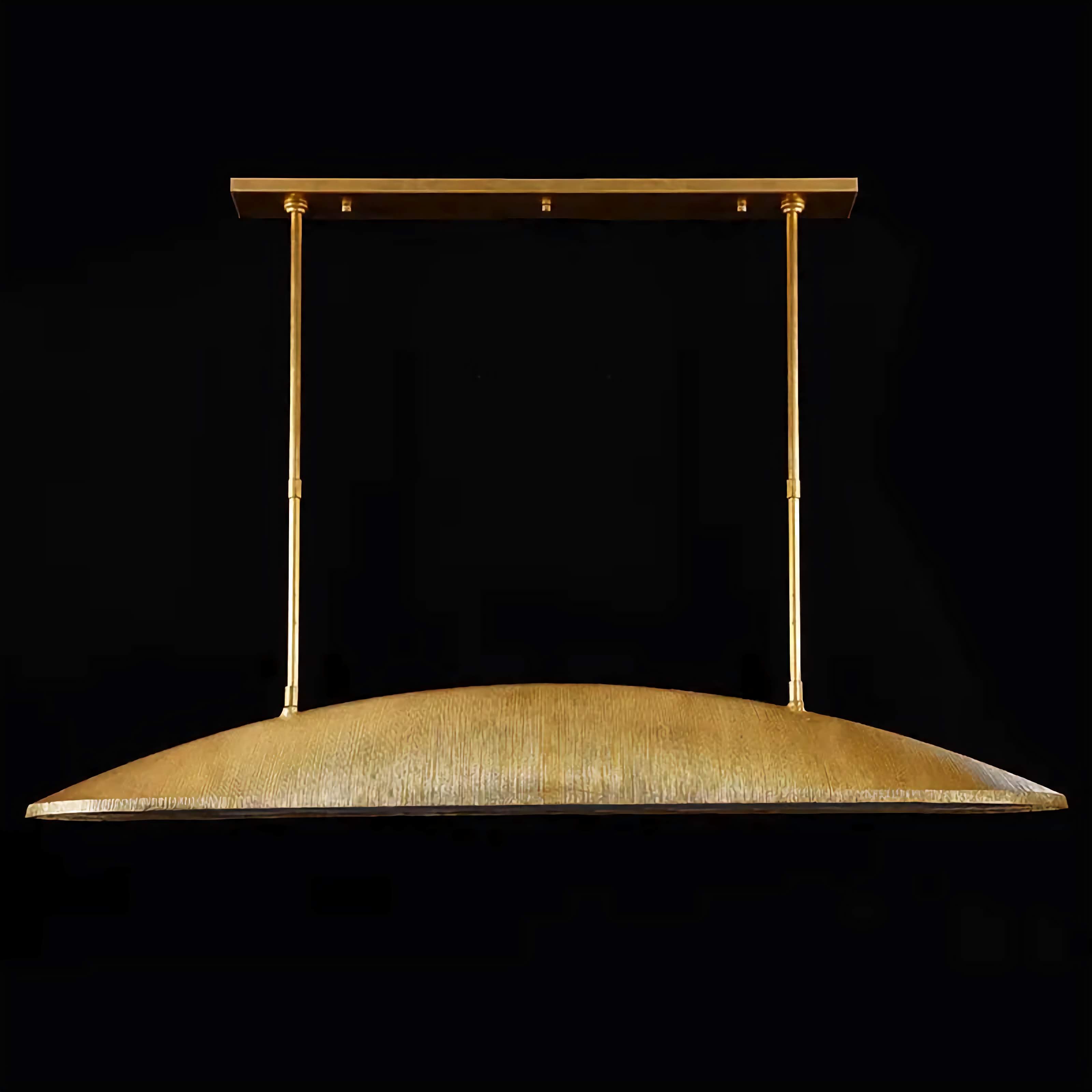 Linear fabric pendant over a dining table