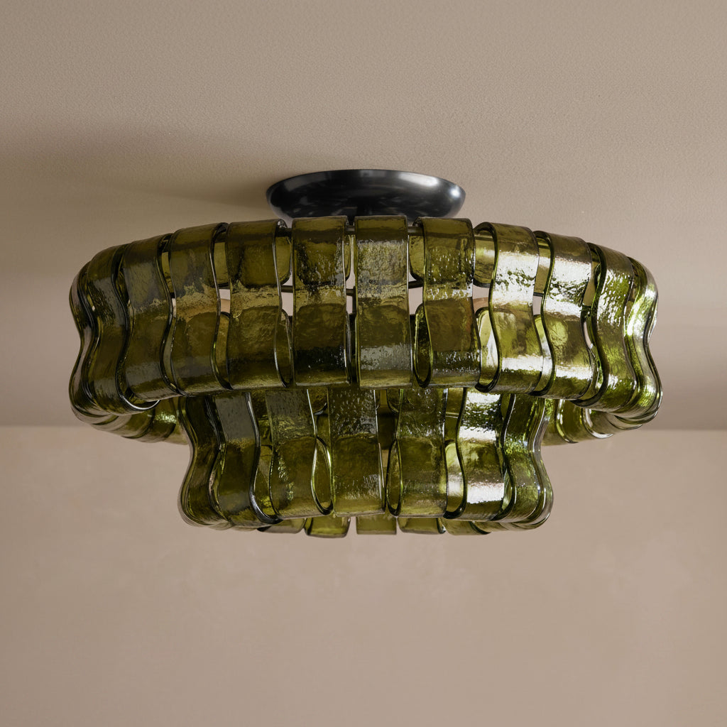 Bellatrix semi-flush mount in textured green glass, unlit, two tiers of curved panels under a bronze canopy