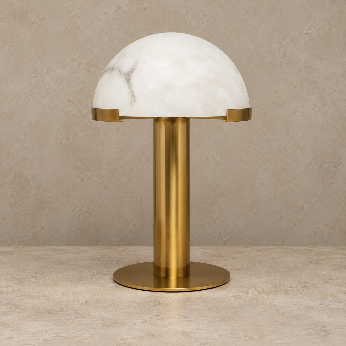 Unlit alabaster dome showing cloudy mineral layers above a brass base.