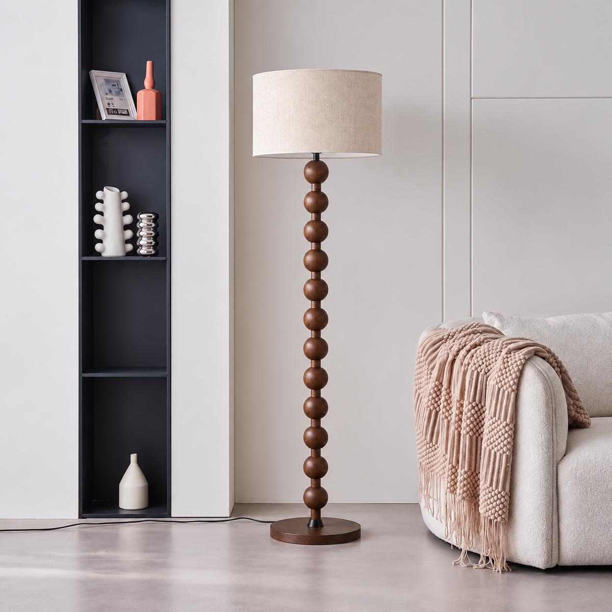 CL40XZ8 walnut-tone floor lamp beside a cream sofa and a black display shelf.