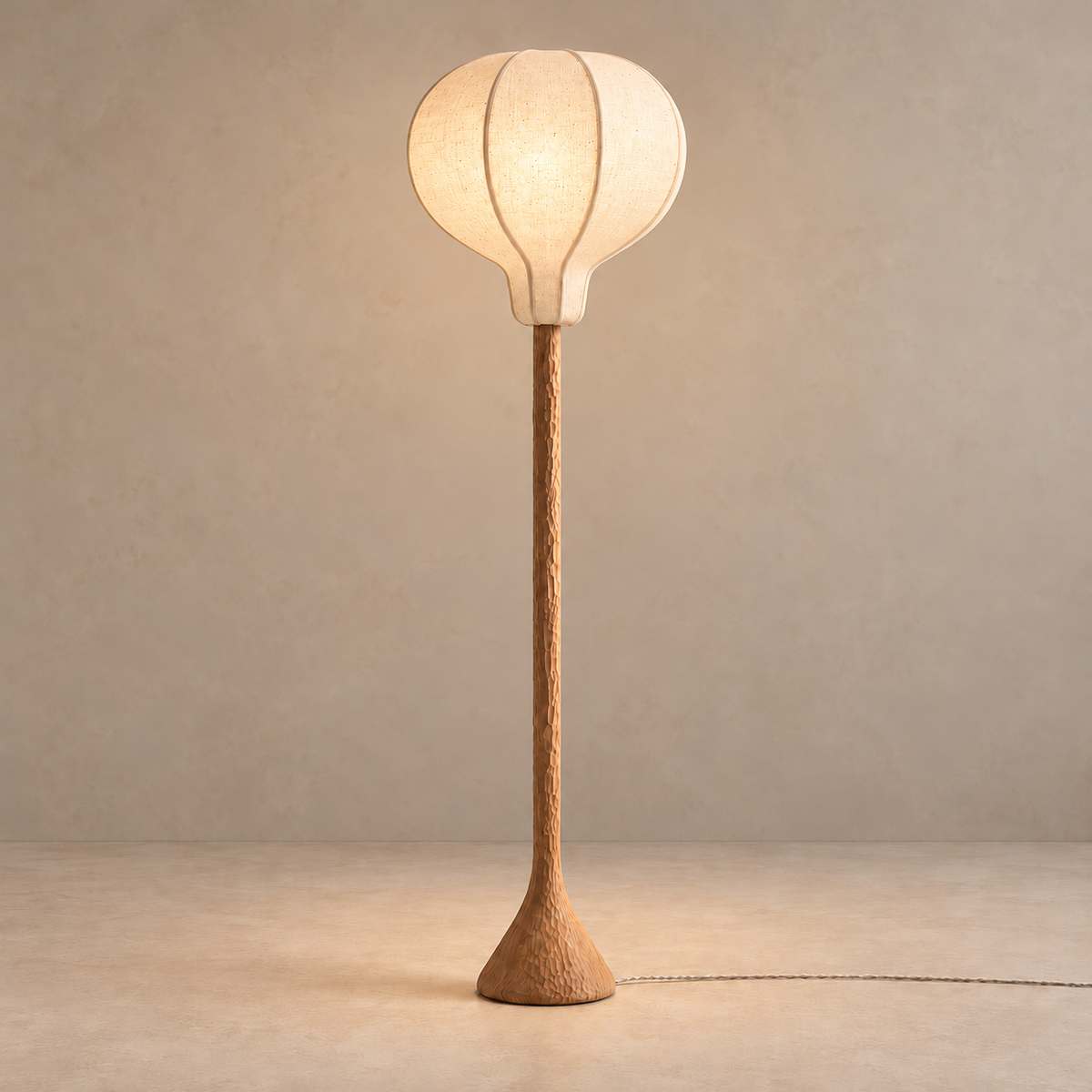 CL70ZZ Balloon floor lamp illuminated, showing the linen texture and curved panel seams.