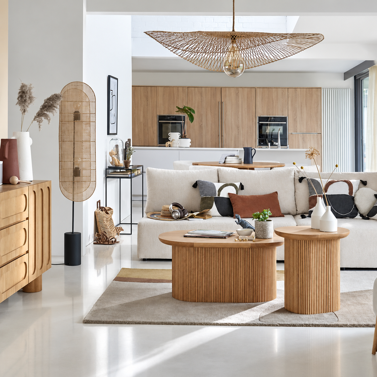 CL85068B wicker floor lamp beside a wooden sideboard and white sofa in a bright living room.