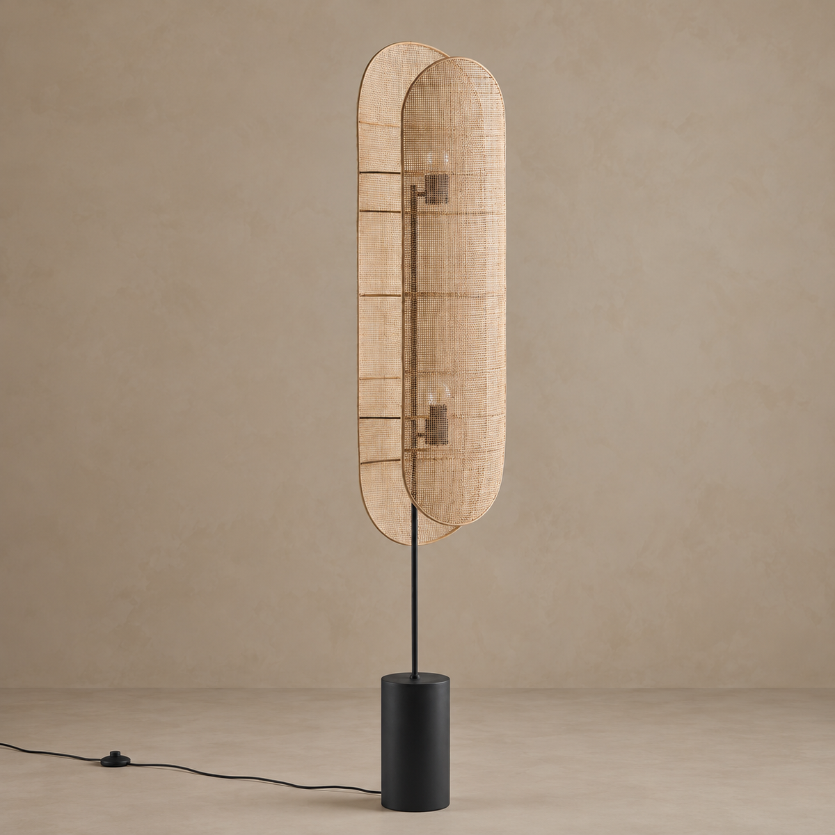 CL85068B wicker floor lamp switched off, with two curved woven panels and a black cylindrical base.
