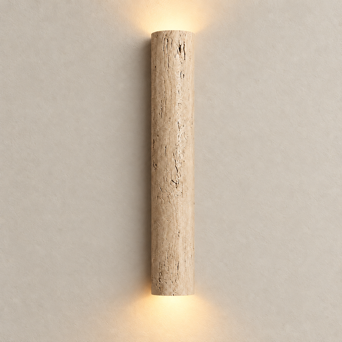 Travertine wall light illuminated on the same beige wall.