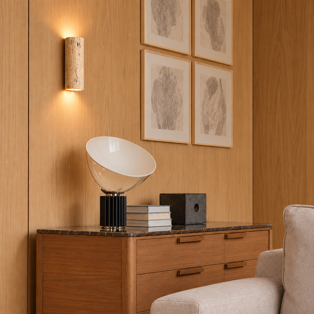 Travertine wall sconce installed above a wood living-room cabinet.