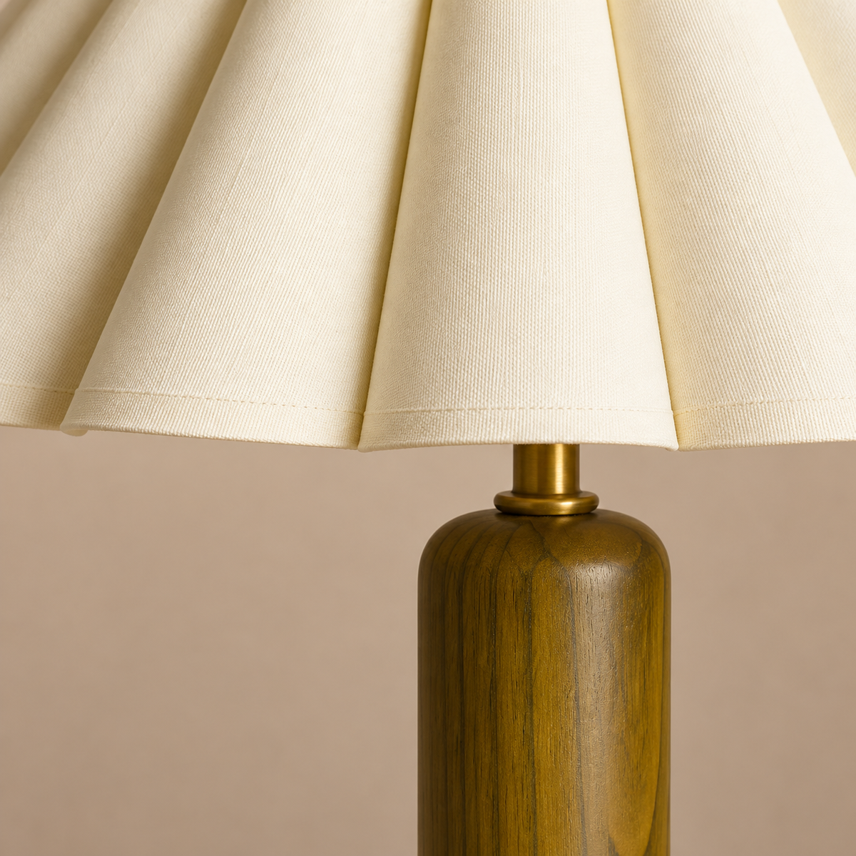 Detail of the pleated fabric shade and olive wood column