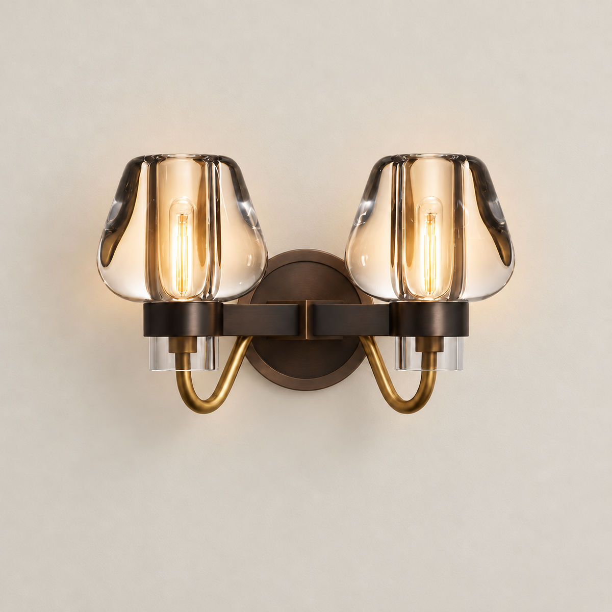 Double crystal glass wall sconce illuminated.