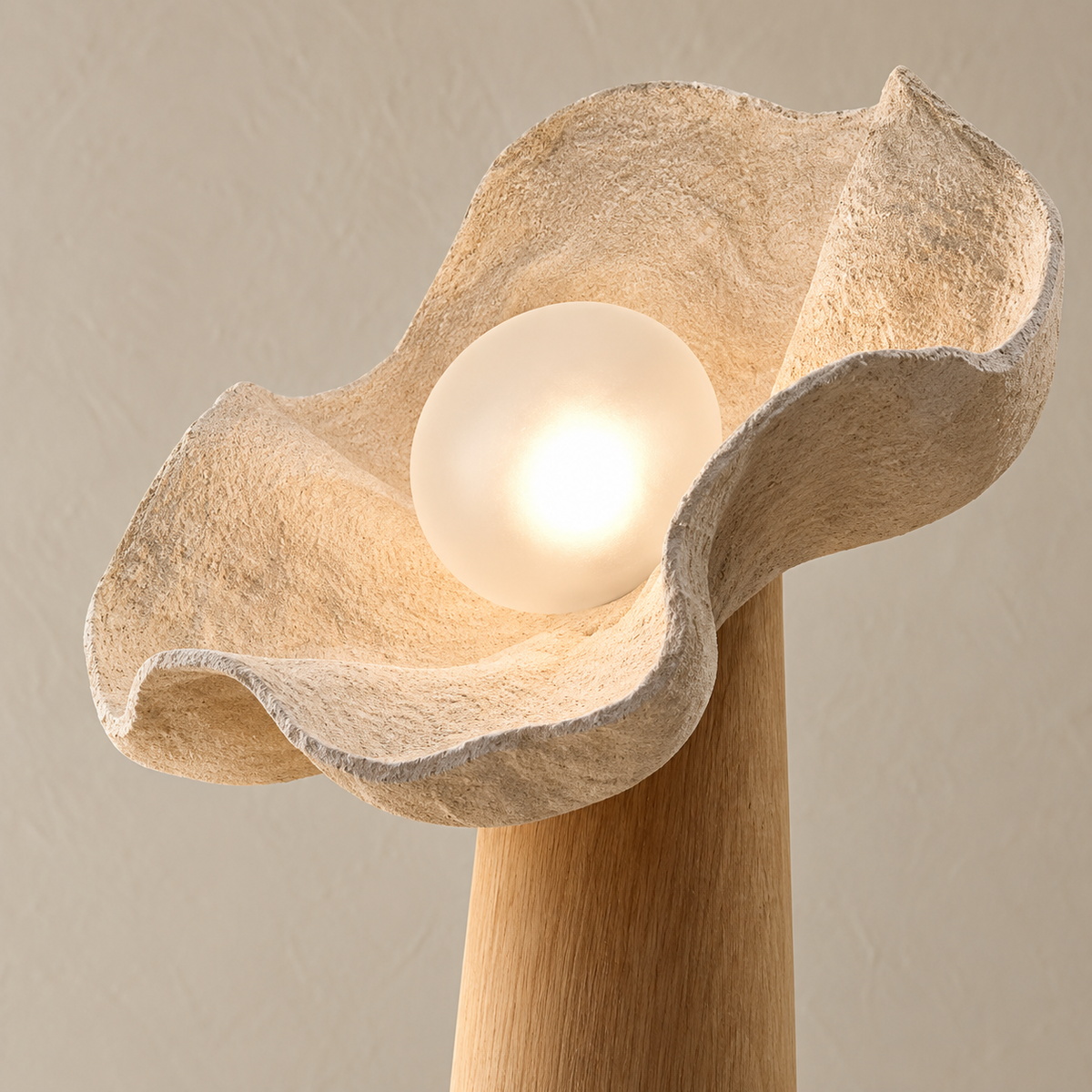 Side detail showing the Petal lamp's folded resin shade and central diffuser.
