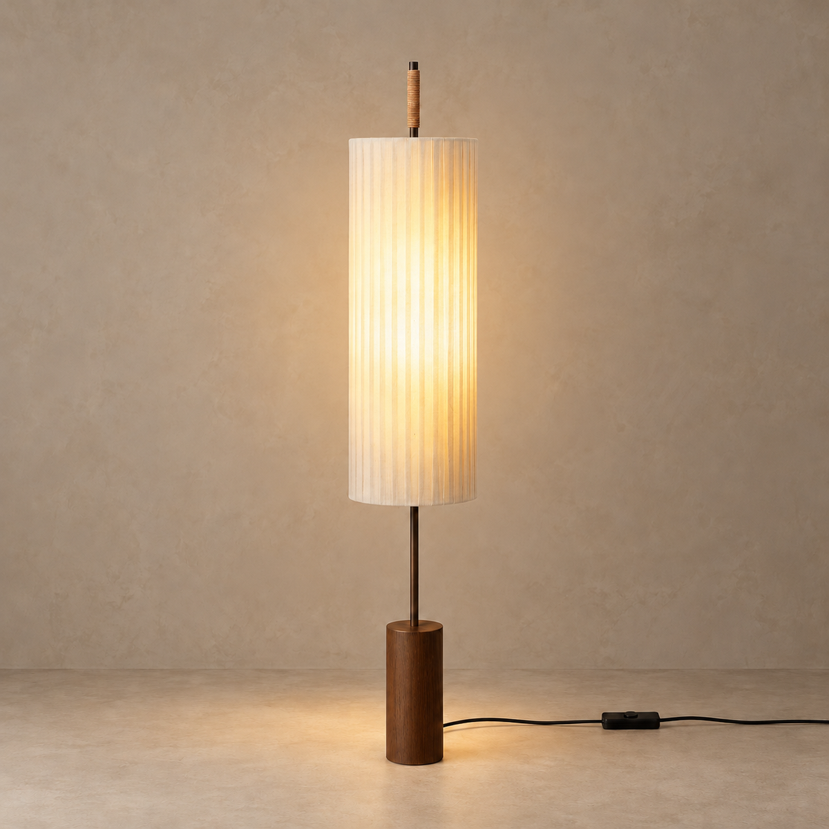 CLHBV0255 floor lamp illuminated through its pleated shade, with the wood base and cord switch visible.