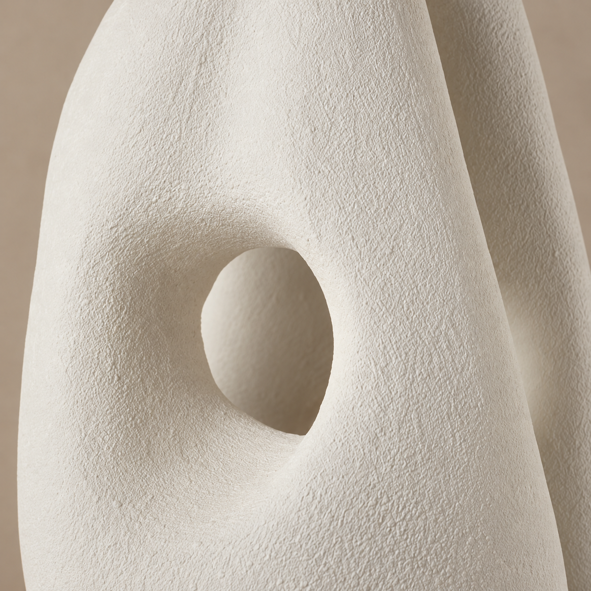 Close-up of the CLK852220 lamp’s oval opening and textured white resin surface