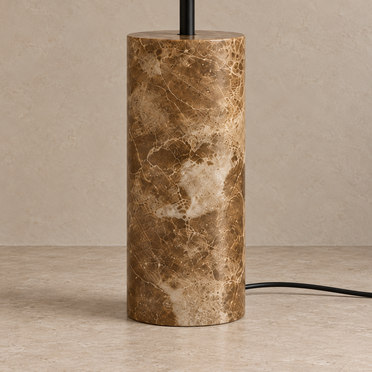 Close view of the CLMARBHS45 marble base, showing pale mineral veins, cloudy markings and the black stem.