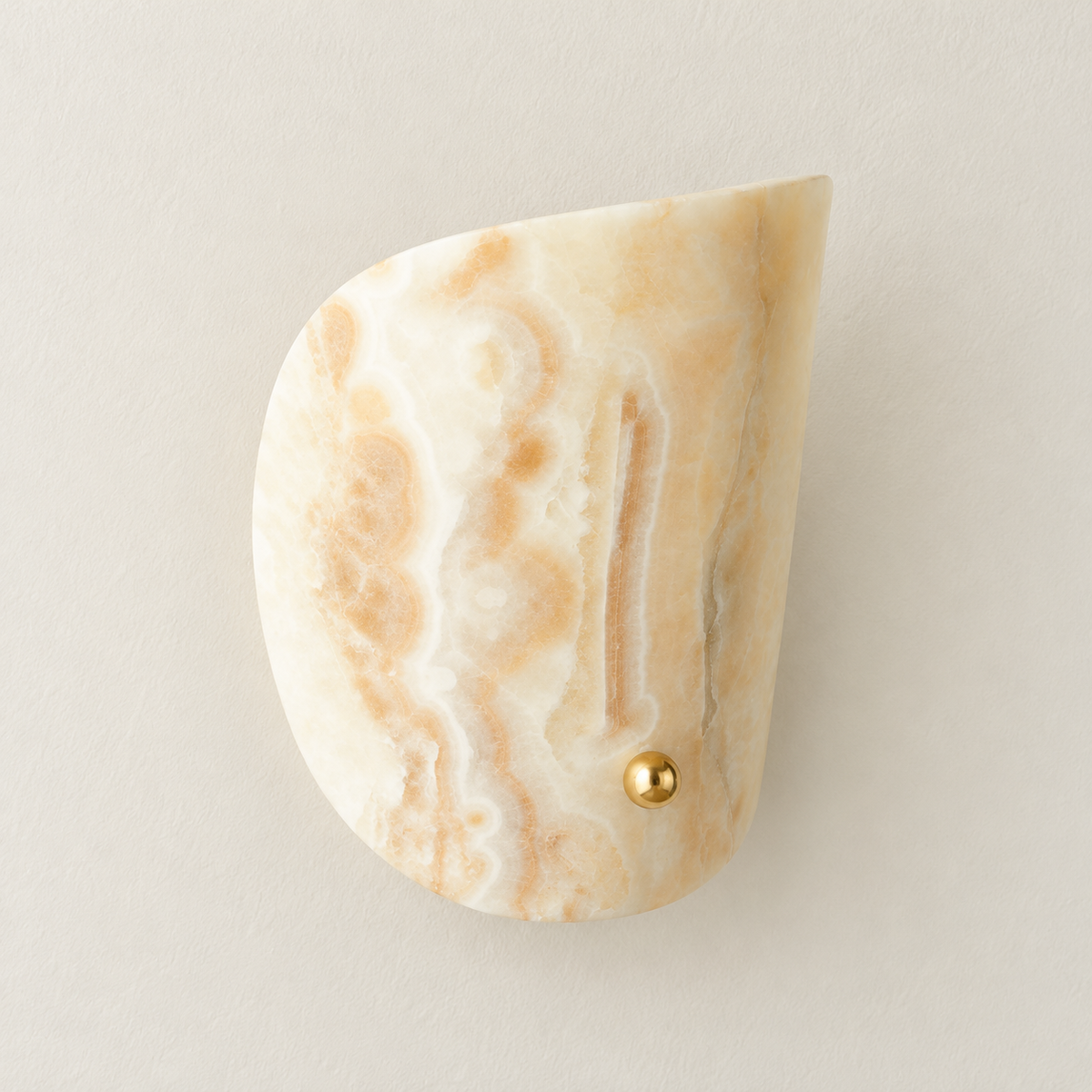 Front view of the curved jade sconce, with cream and caramel bands and a brass ball fastener.