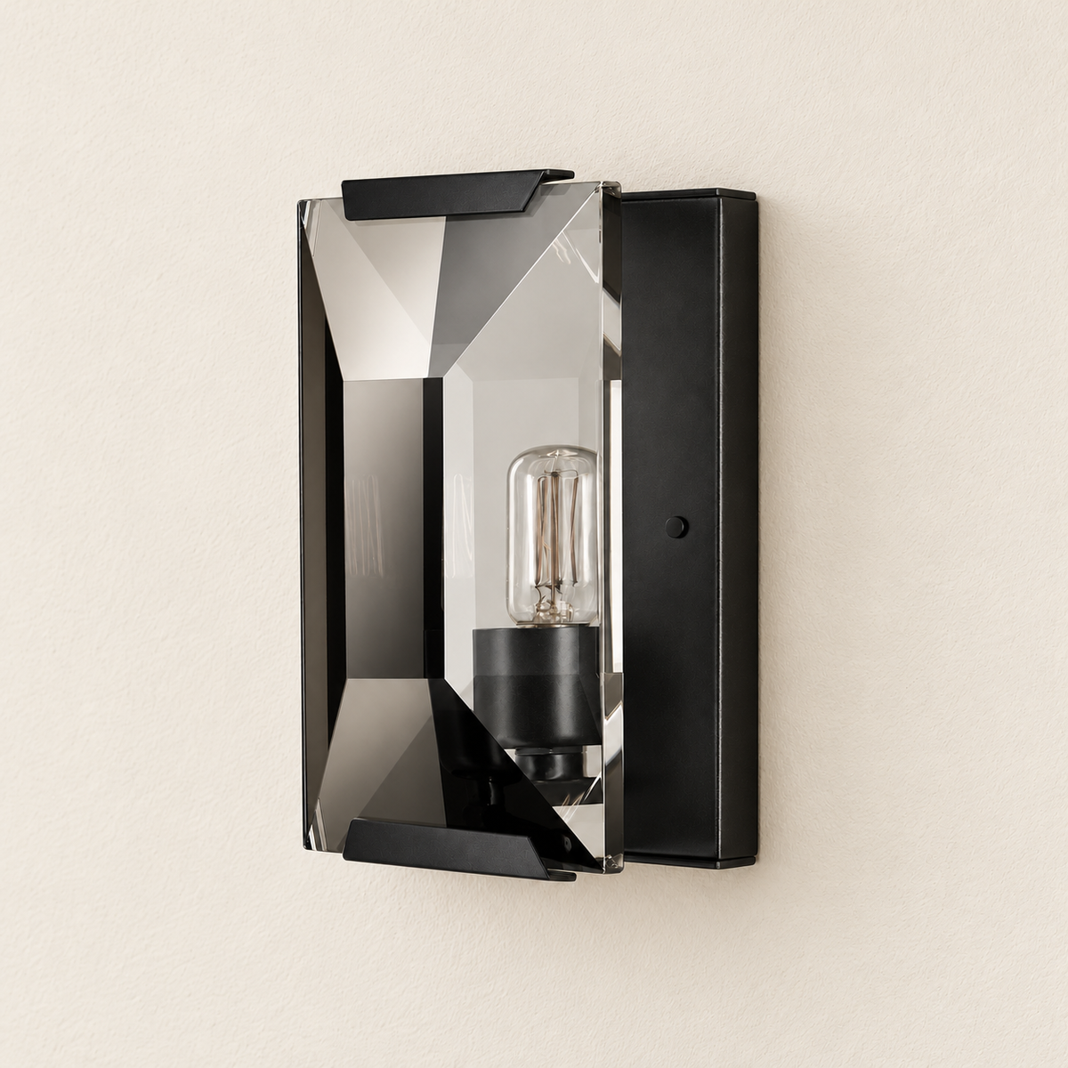 Single crystal wall sconce with black mounting hardware and a clear beveled panel.