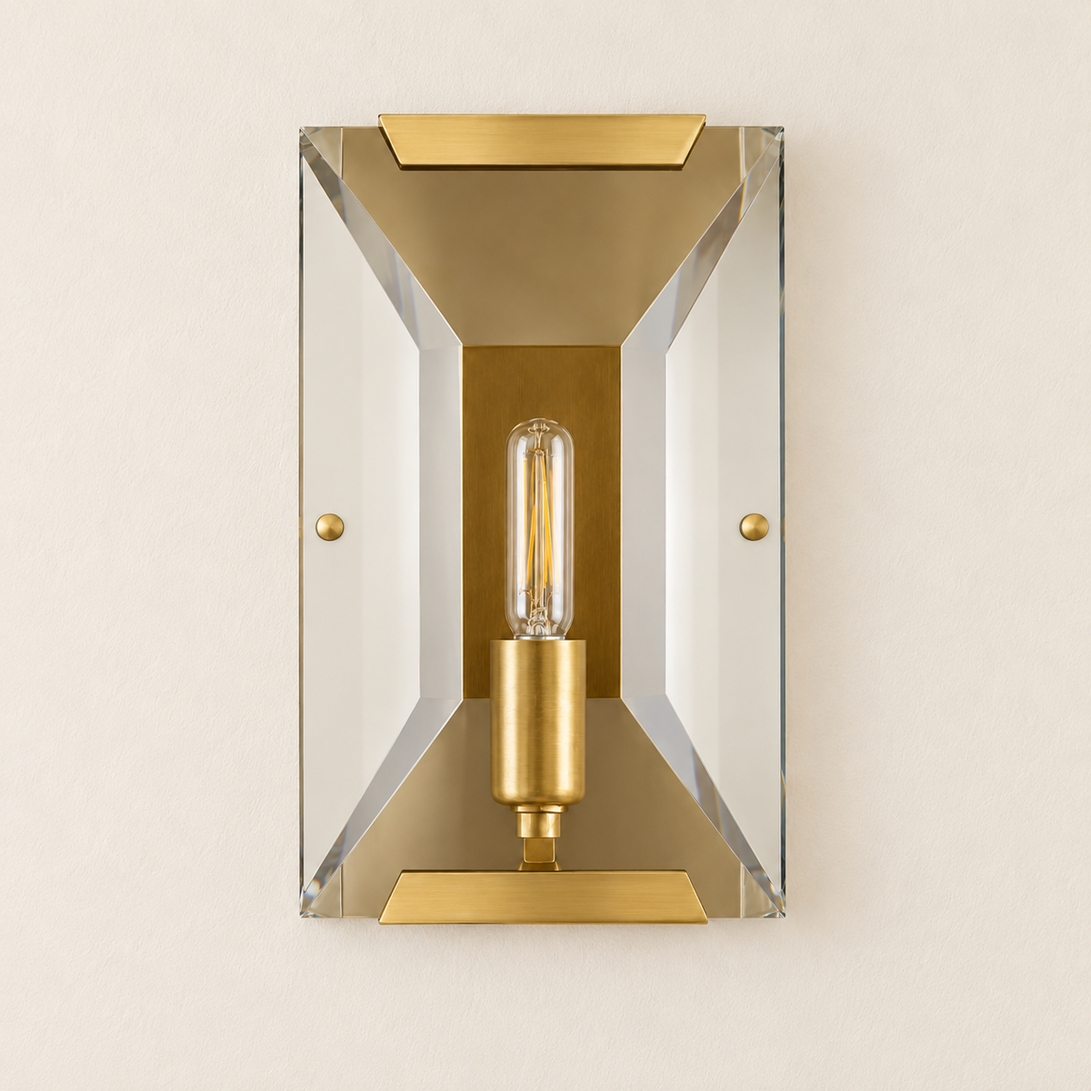 Front view of the unlit 26 cm tall crystal wall sconce in brass.
