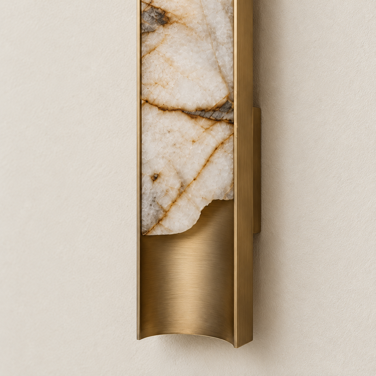 Detail of natural onyx and curved brass backing.