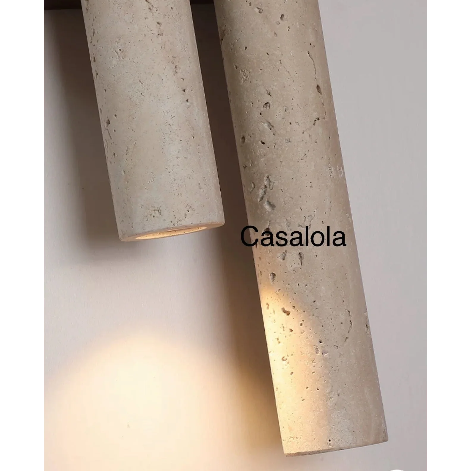 Travertine and wood wall light in a corridor