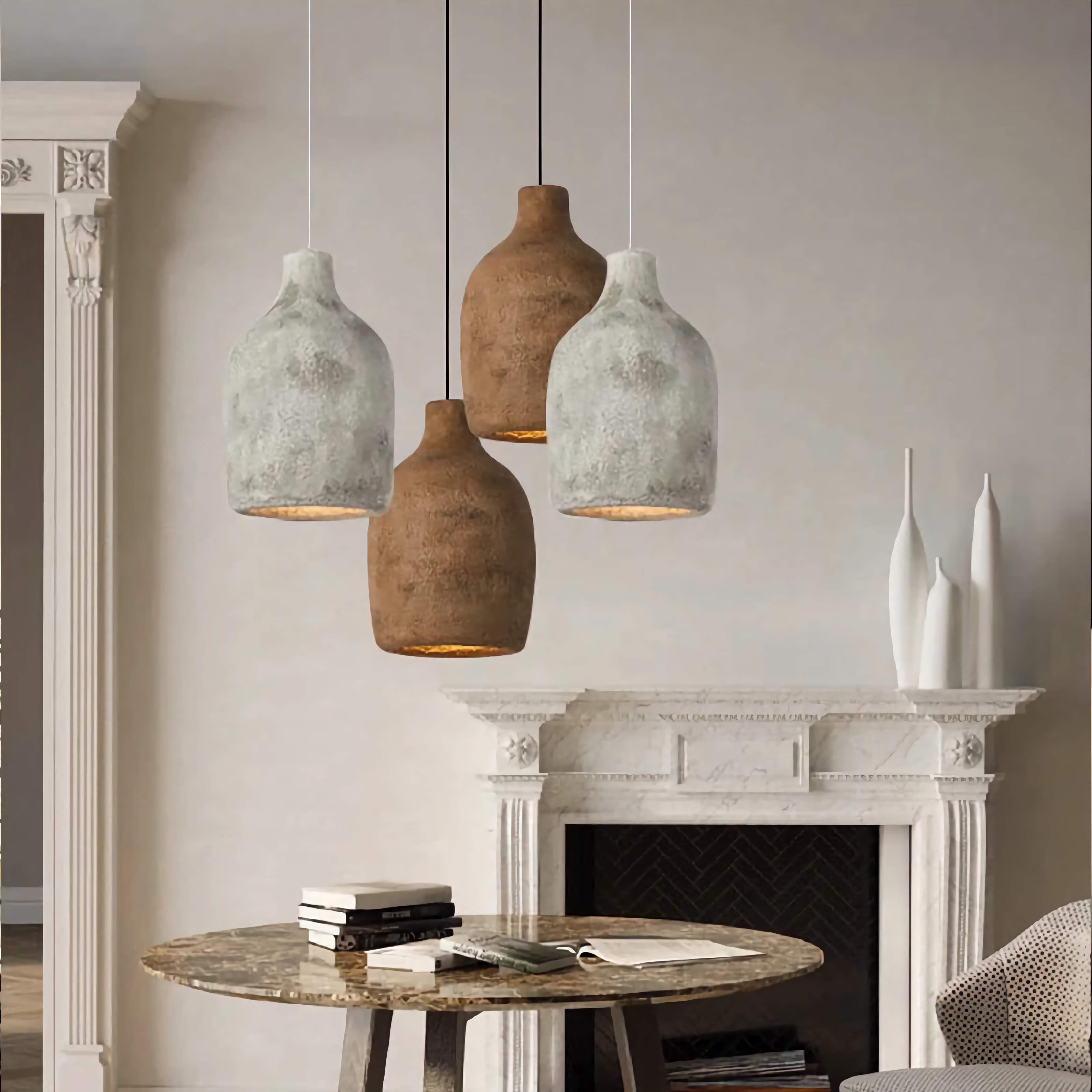 Earth-tone wabi-sabi resin pendant over a dining table