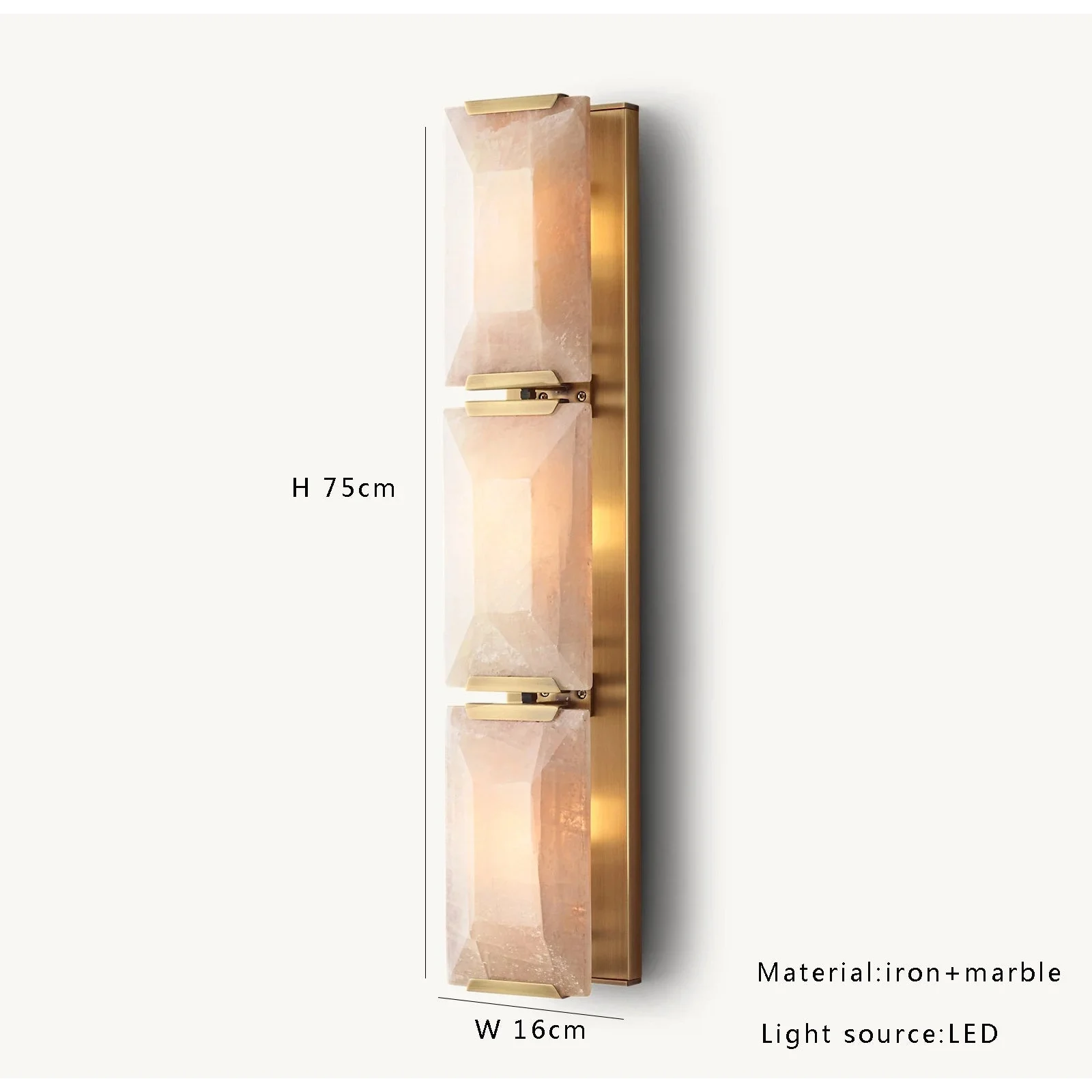 Gold triple calcite sconce in a hallway
