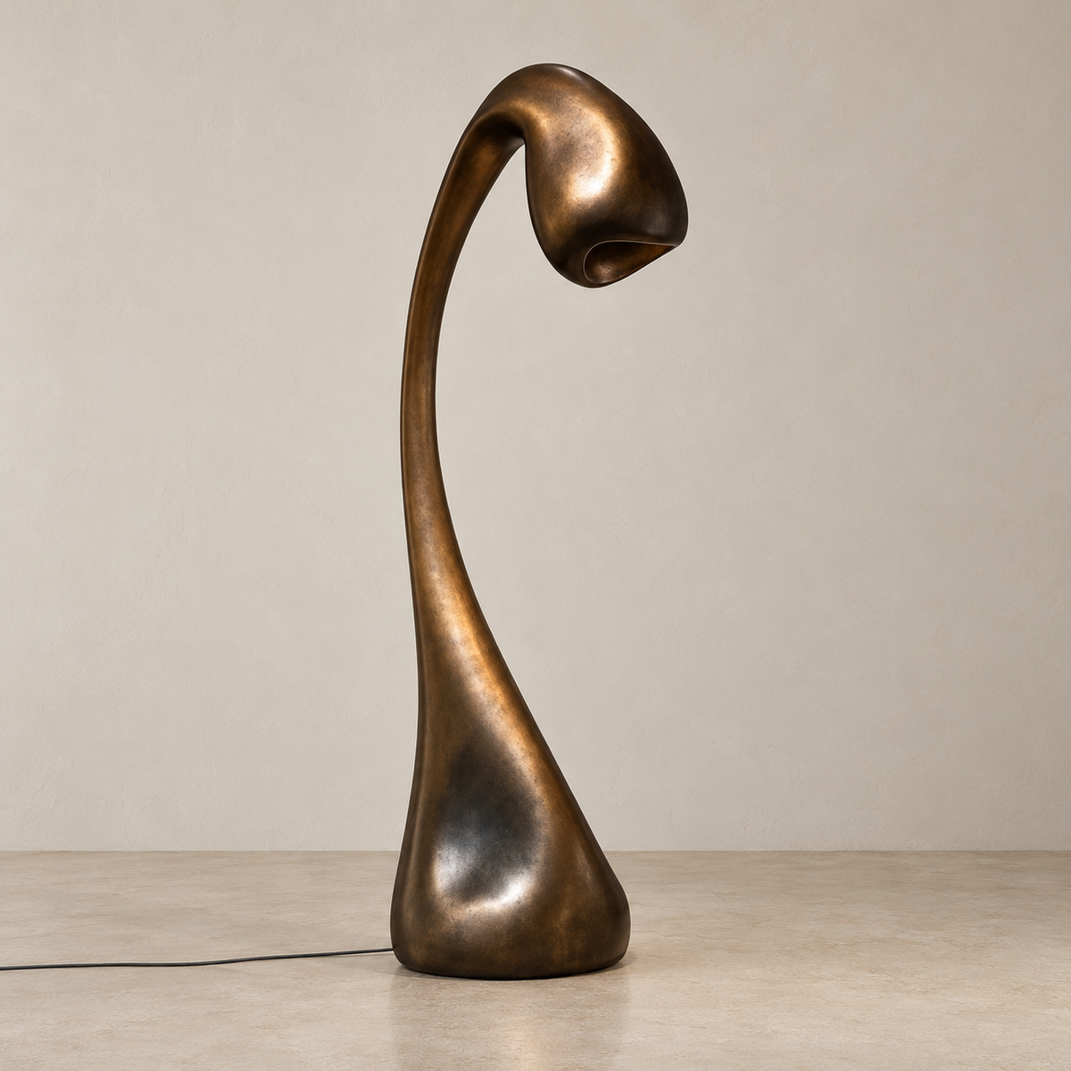 Hadrian Arc floor lamp switched off, showing its curved neck and dark patinated resin body.