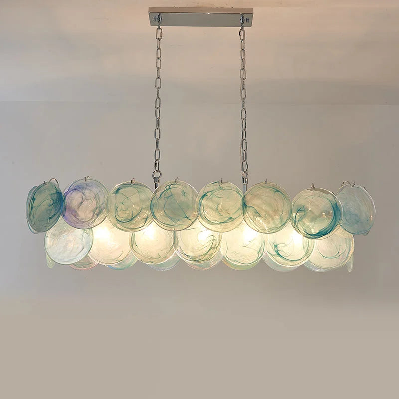 Green glass chandelier in a living room