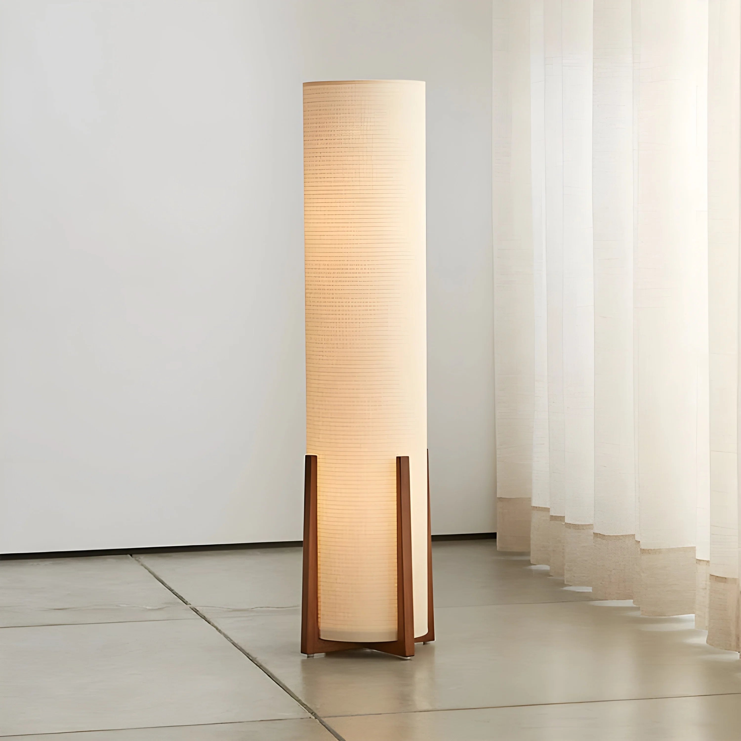 Bamboo and walnut floor lamp in a bedroom