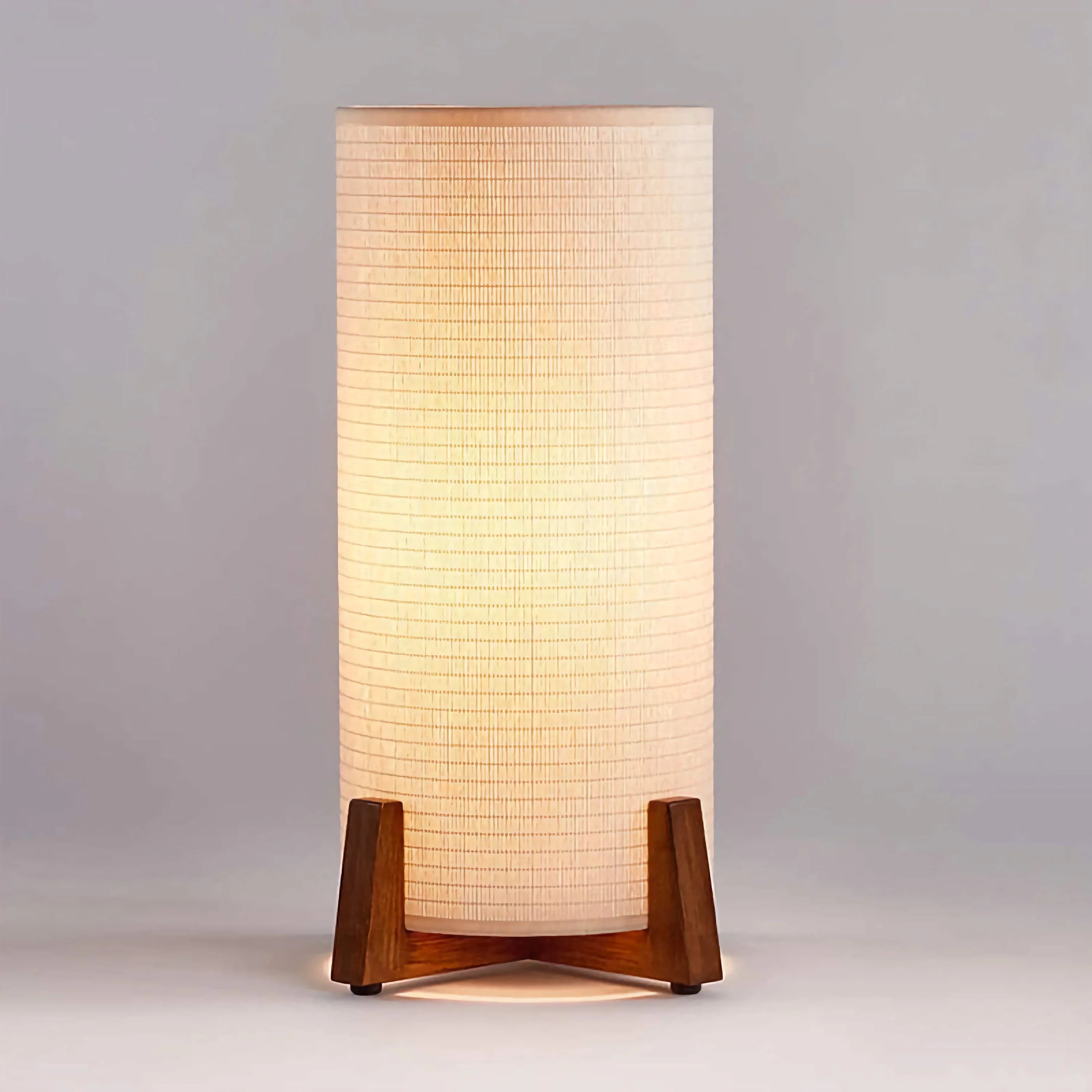 Solid wood lamp with an elongated fabric shade