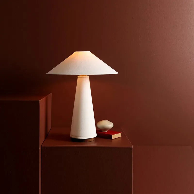 Classic-modern bedside lamp glowing warm
