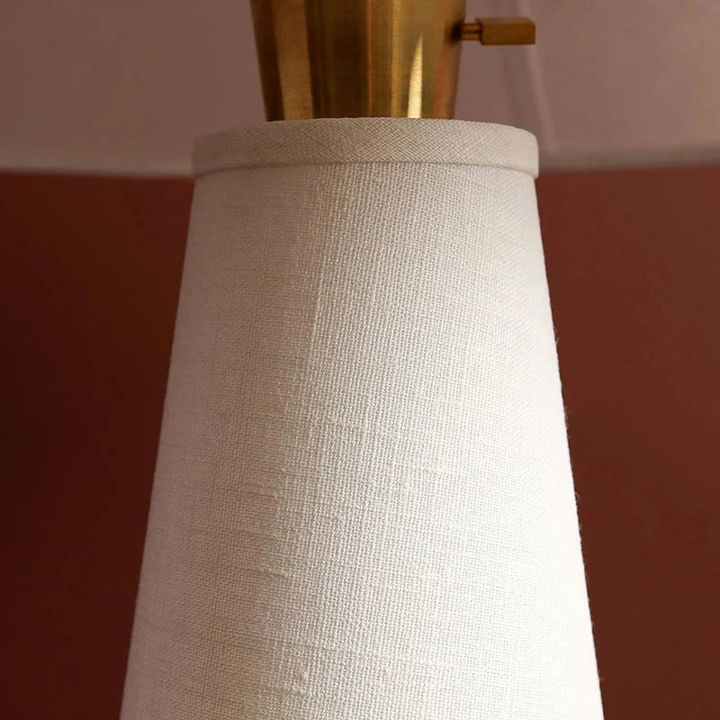 Ivory bedside lamp with textile shade