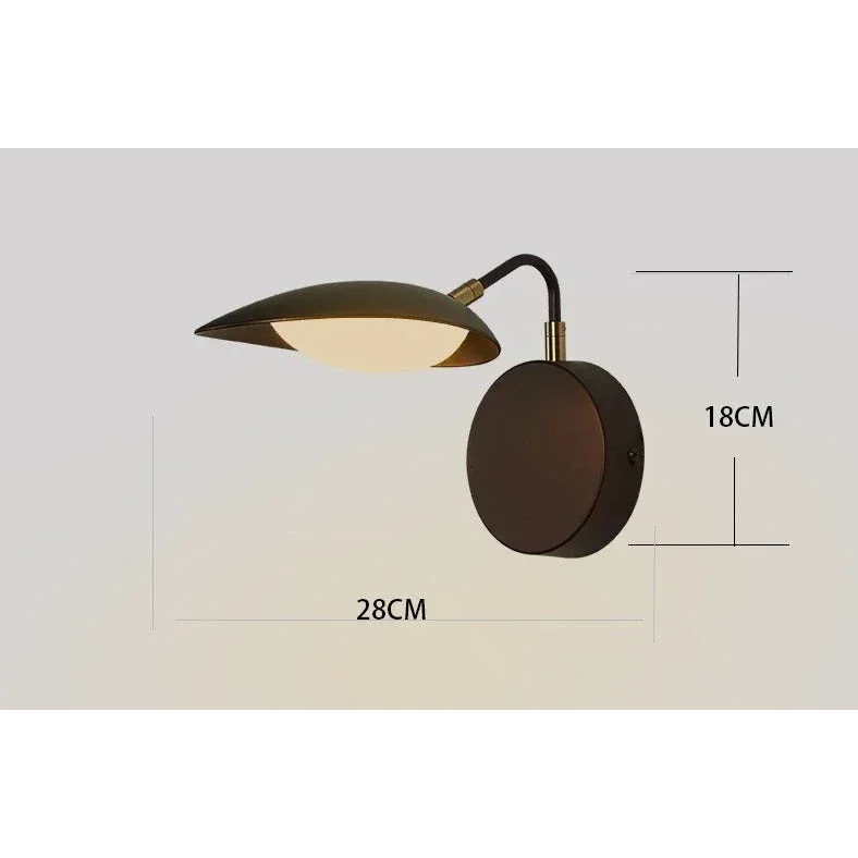 Detail of the swing arm on a wall lamp