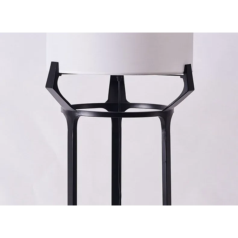 Slim standing lamp casting ambient light