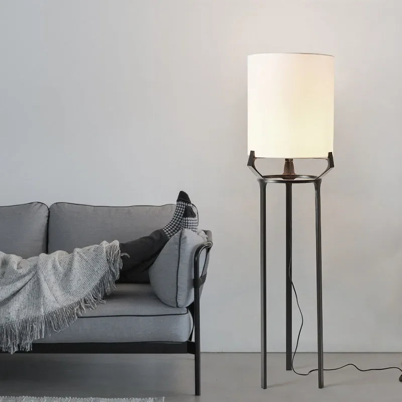 Stainless-steel floor lamp in a modern interior