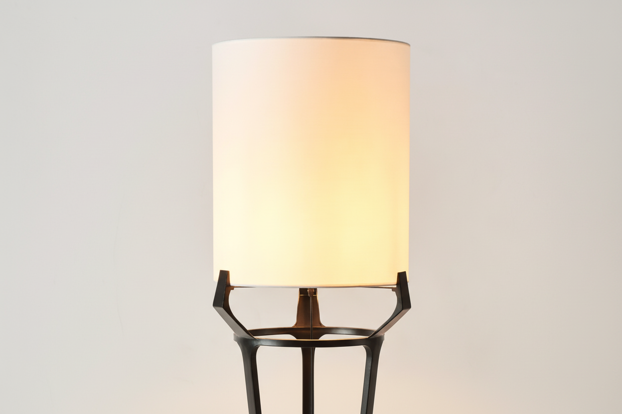 Modern floor lamp casting a soft upward glow