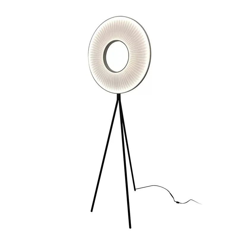 Modern knitted-shade floor lamp glowing warm