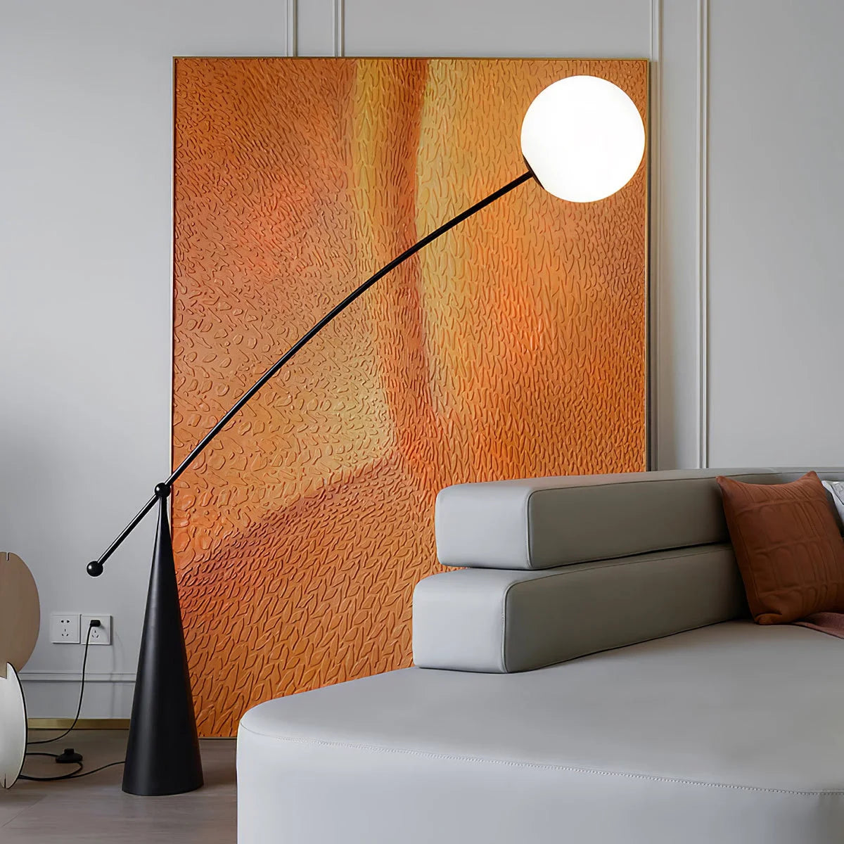 Curved steel floor lamp with a soft glass diffuser