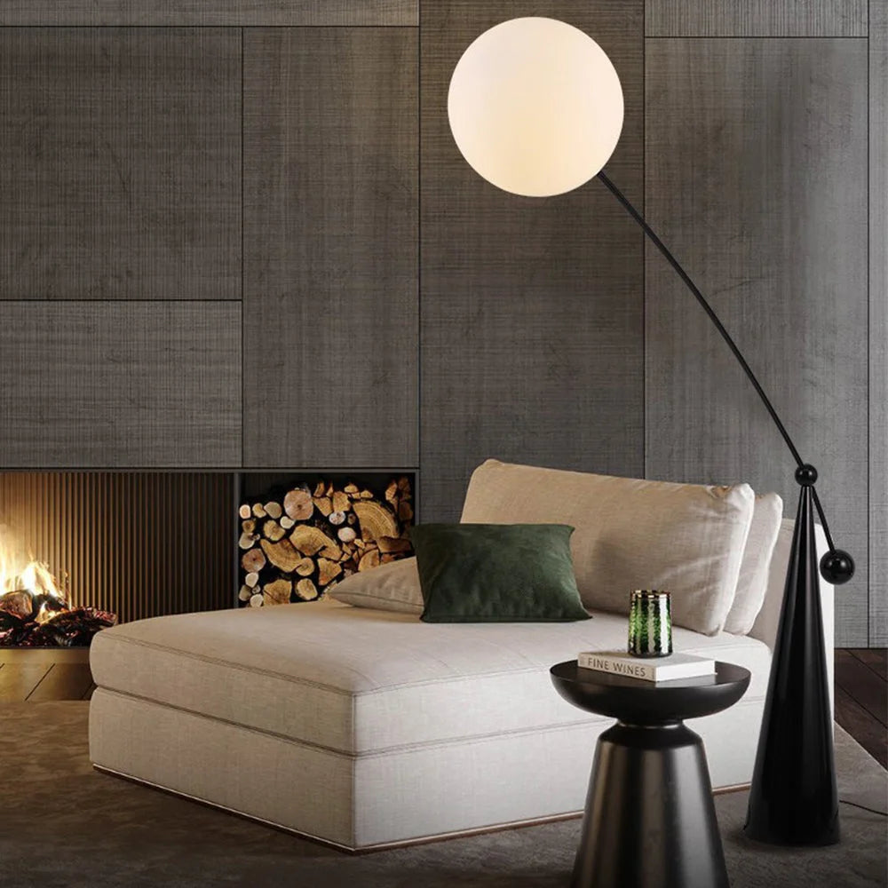 Sculptural arc floor lamp in an office