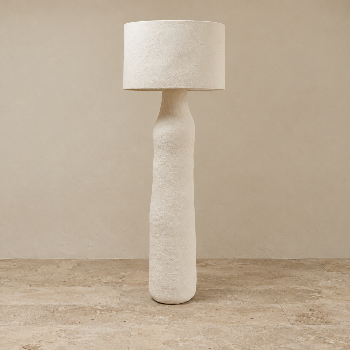 Angled view of the Mountain floor lamp showing its sculpted resin column.