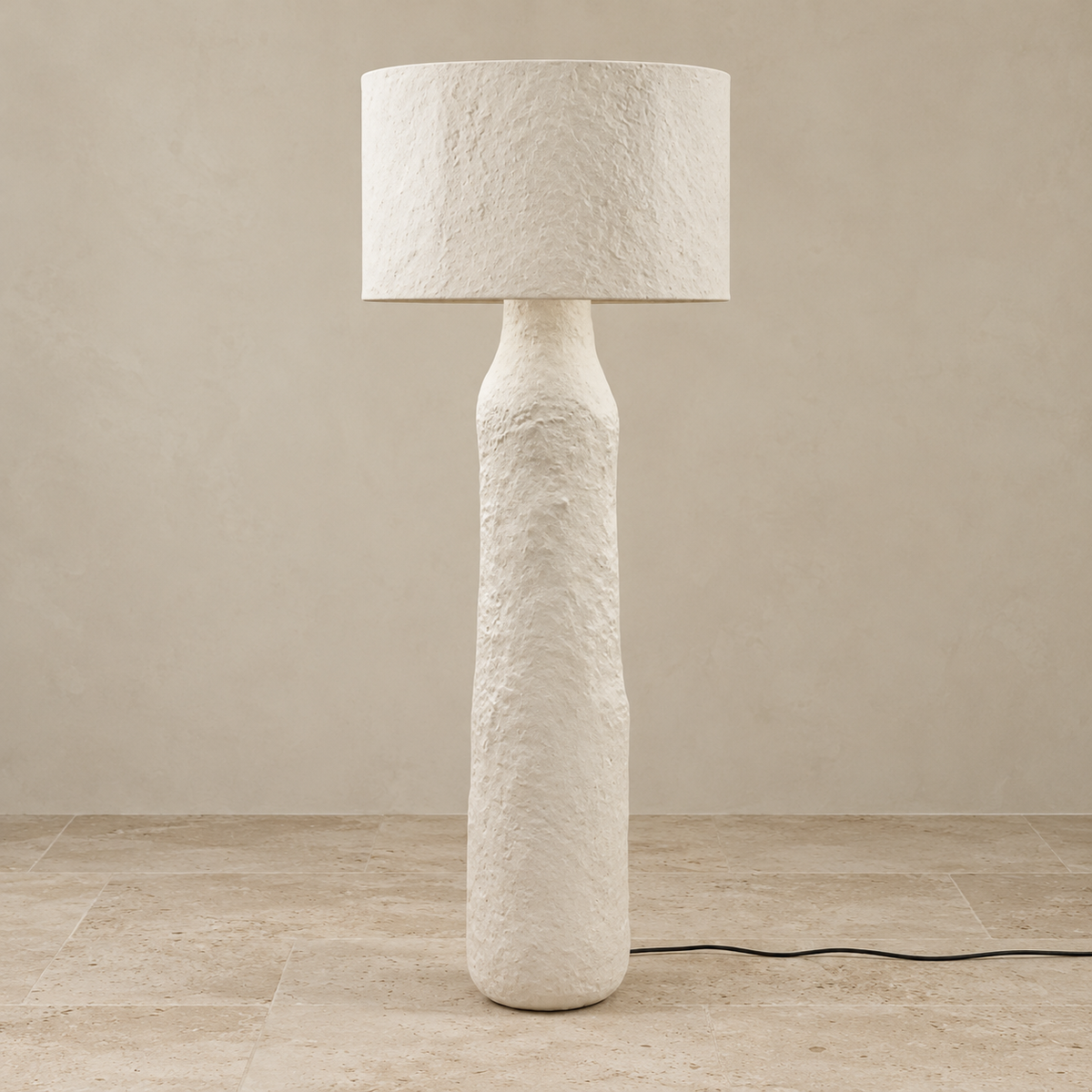 Mountain floor lamp switched off, with an ivory textured resin body and broad oval shade.