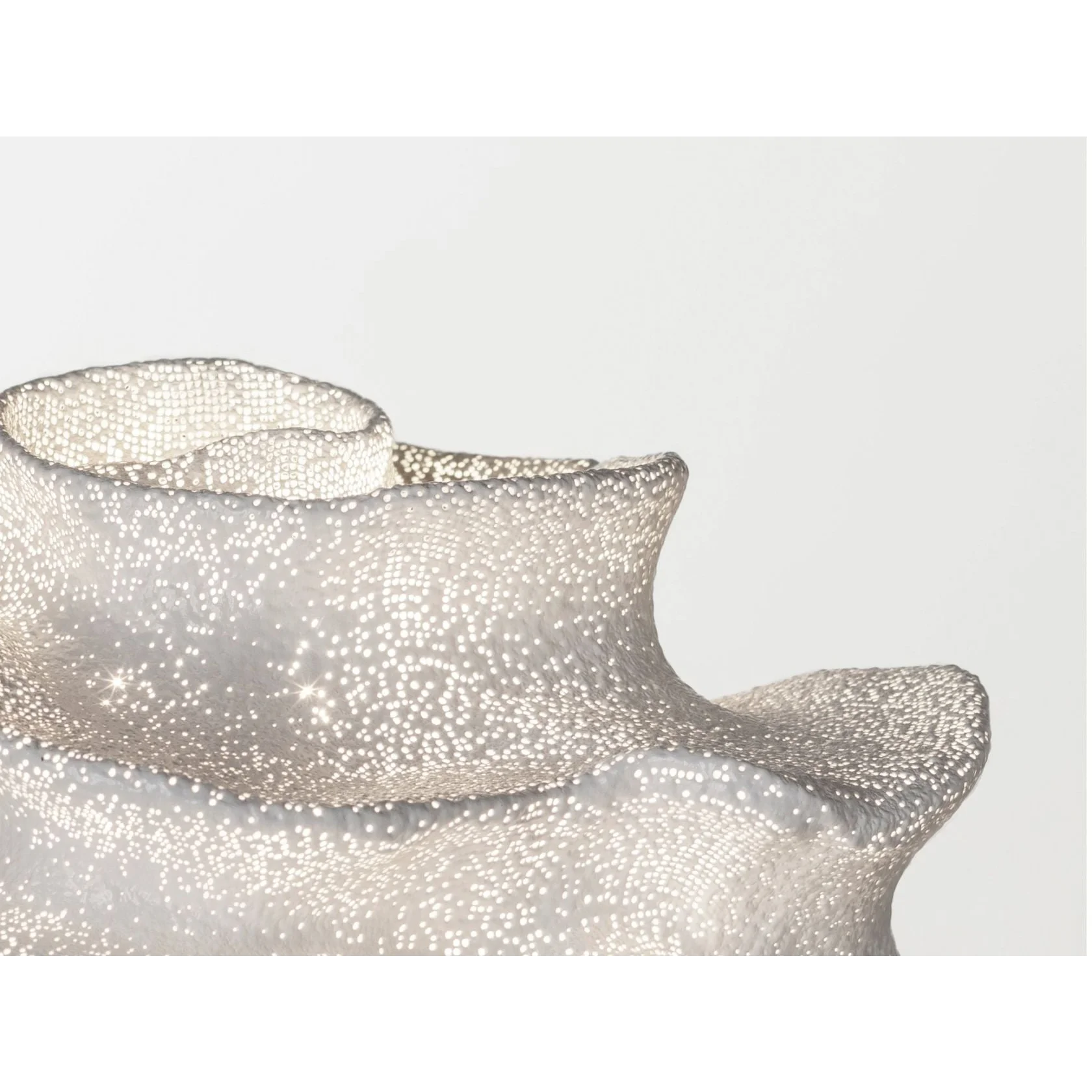 Starry glass and weighted chrome base detail