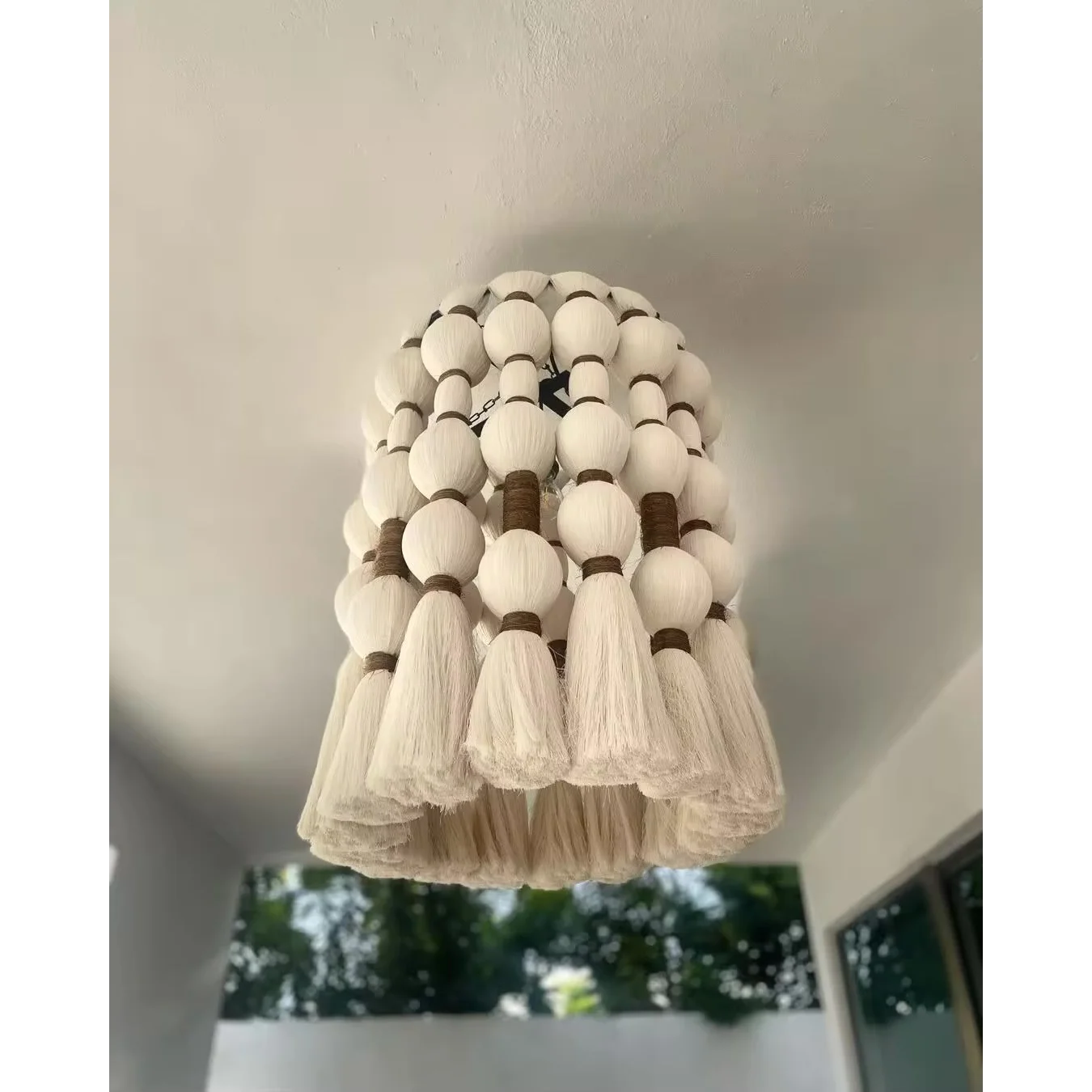 Woven cotton and natural bead detail