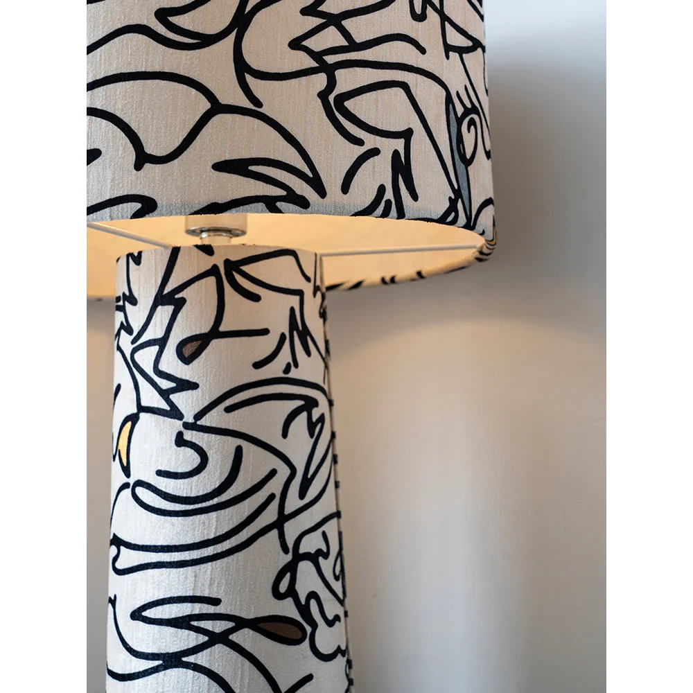 Patterned art table lamp in a creative studio