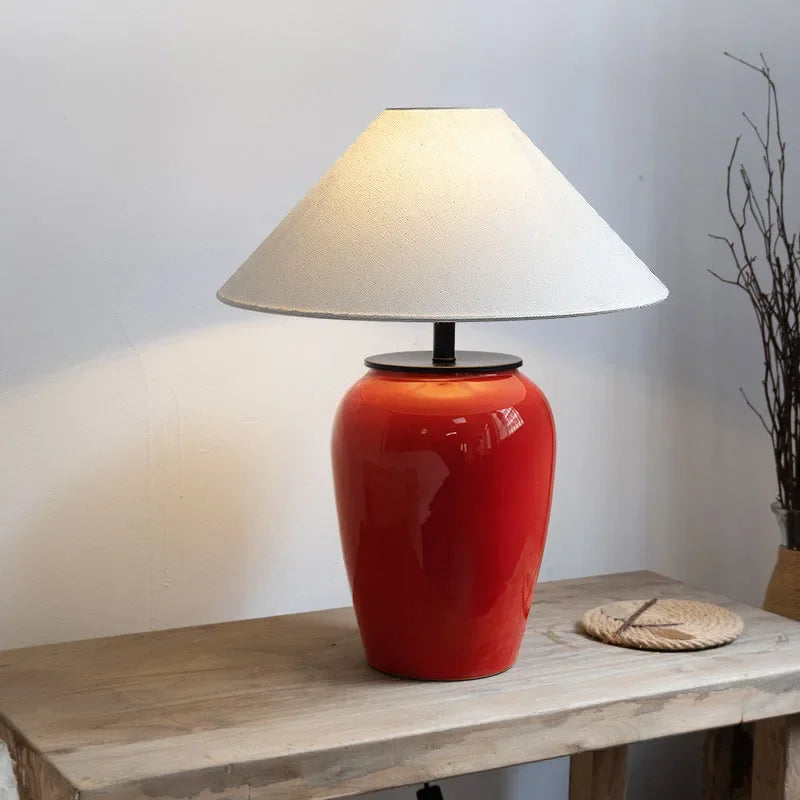 Bold red ceramic table lamp in a contemporary interior