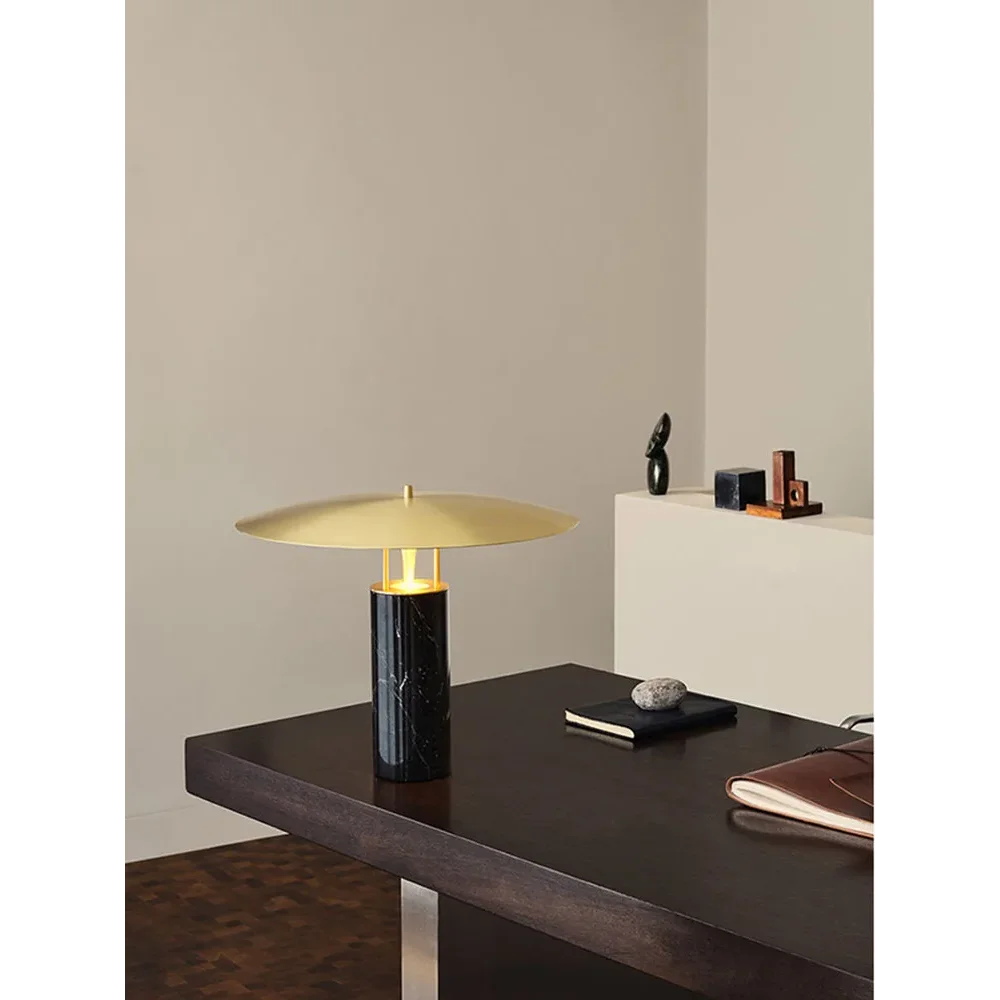 Marble table lamp casting reading light