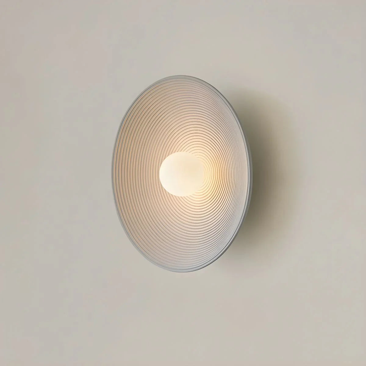 Round wabi-sabi iron wall light full view